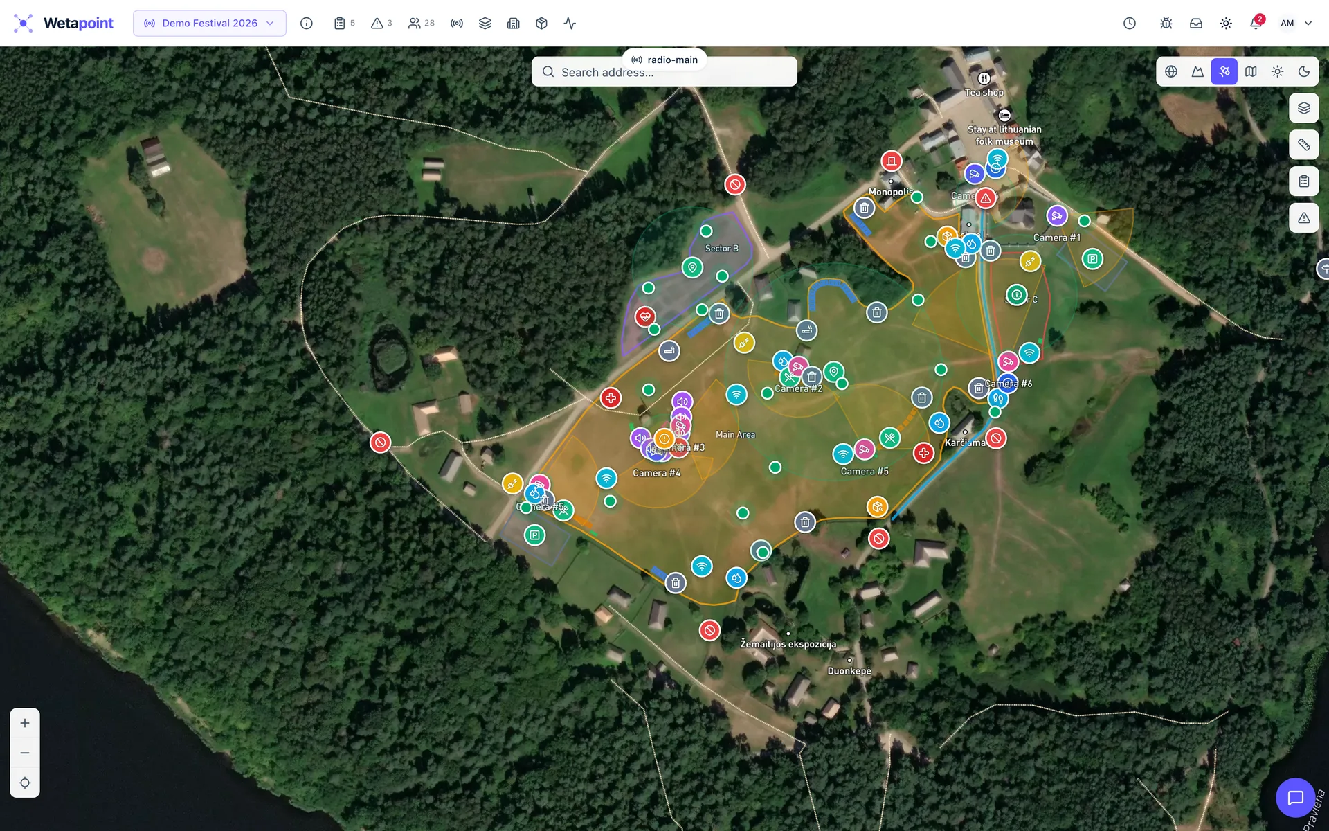 Operations console: satellite city map with zones, vehicle markers, and route coverage